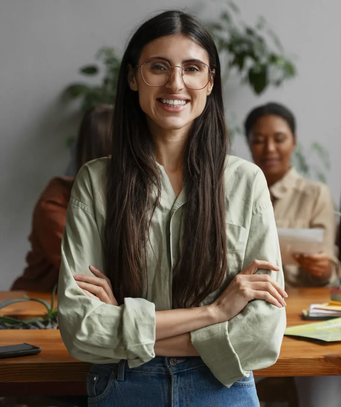 A Keiser University student working at a laptop